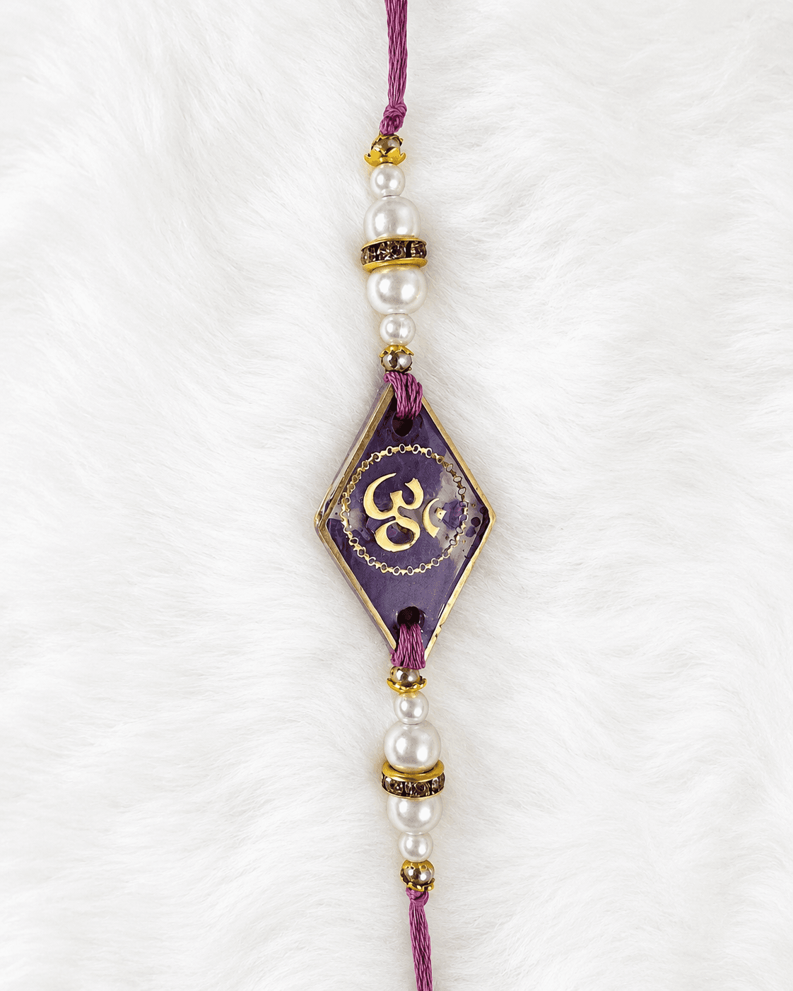 Om Amethyst Kite Rakhi