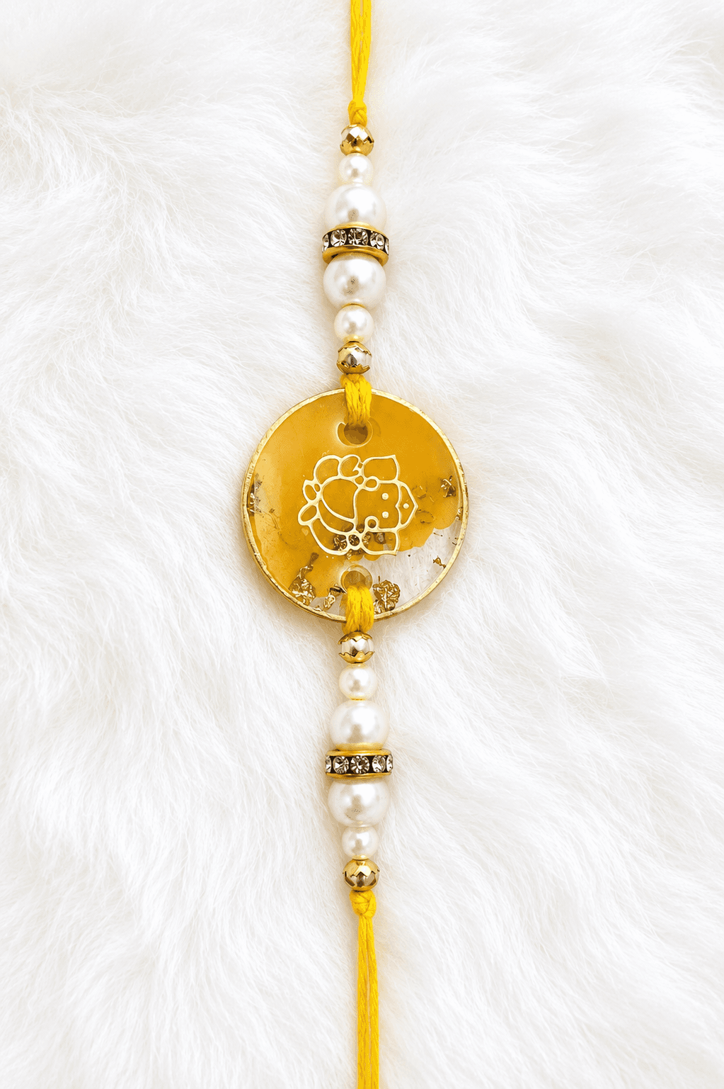 Golden Ganesha Amber Rakhi