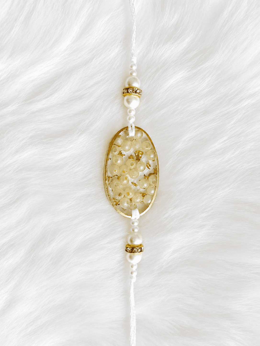 Ivory Pearl Oval Rakhi